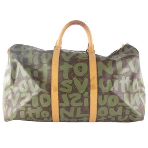 Pre-owned Brunt skinn Louis Vuitton Keepall