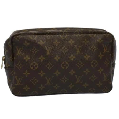 Pre-owned Brunt lerret Louis Vuitton toalettmappe