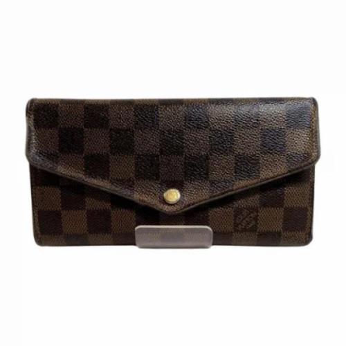 Pre-owned Brunt lerret Louis Vuitton lommebok