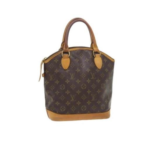 Pre-owned Brunt lerret Louis Vuitton veske