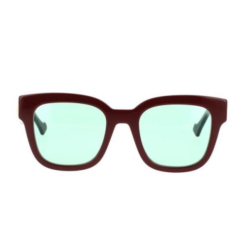 Minimalistiske firkantede solbriller med grønne linser