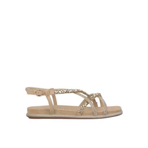 Flat sandal med kryssrem