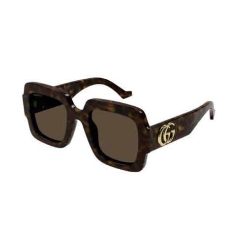 Stilige solbriller med brune linser