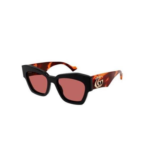 Cat-eye solbriller i svart/oransje/rød skilpadde