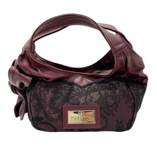 Pre-owned Fabric handbags