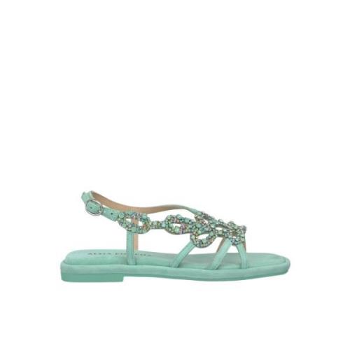 Flat sandal med spenne