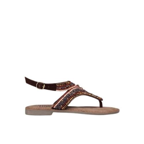 Fargerik perleflat sandal