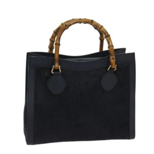 Pre-owned Suede handbags