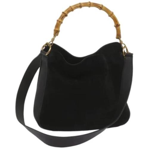 Pre-owned Suede handbags