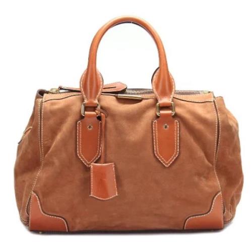 Pre-owned Canvas handbags