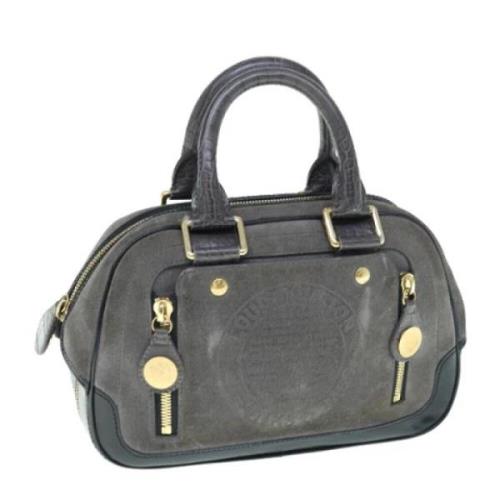 Pre-owned Suede handbags