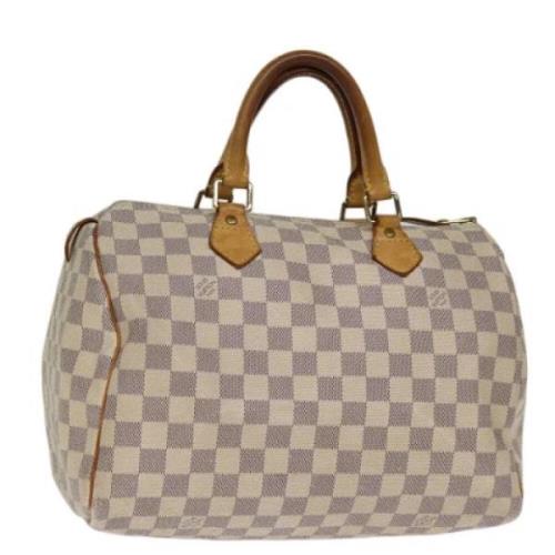 Pre-owned Canvas handbags