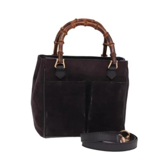 Pre-owned Suede handbags