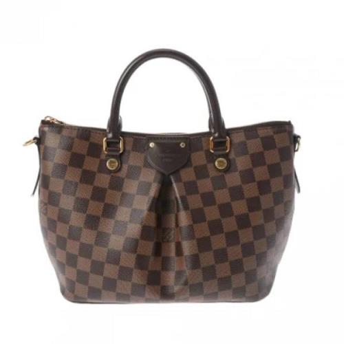 Pre-owned Fabric handbags