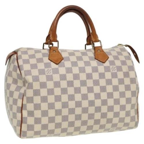 Pre-owned Canvas handbags