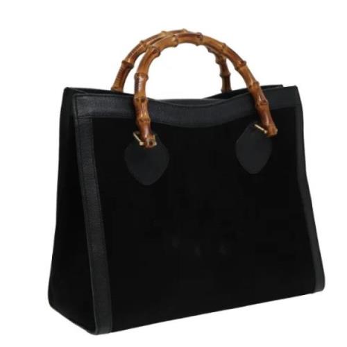 Pre-owned Suede handbags