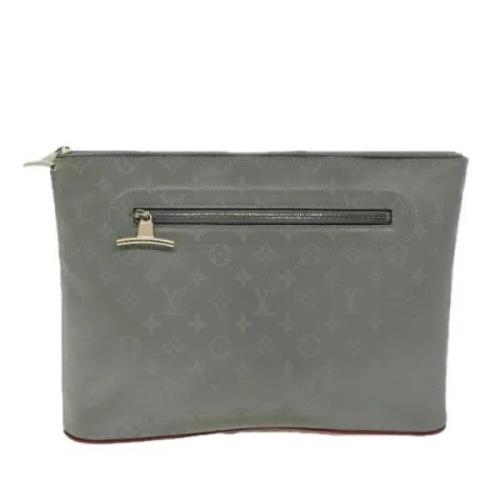 Pre-owned Canvas clutches