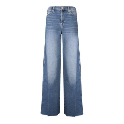 Moderne Flare Jeans med Frynset Hem