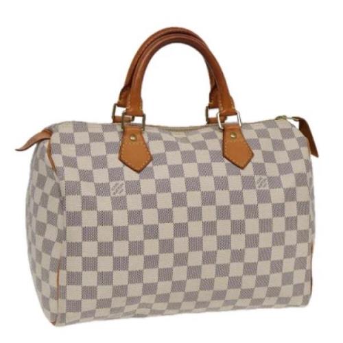 Pre-owned Canvas handbags