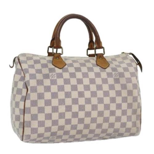 Pre-owned Canvas handbags