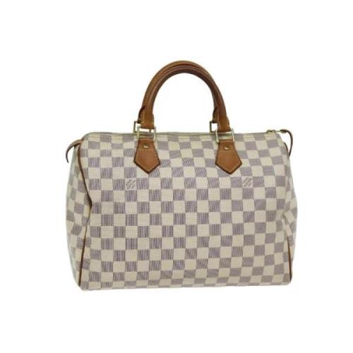 Pre-owned Canvas handbags