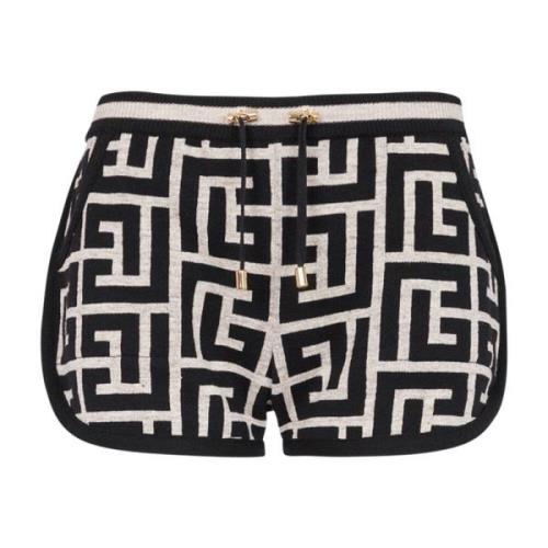 Tosidig monogramstrikket shorts