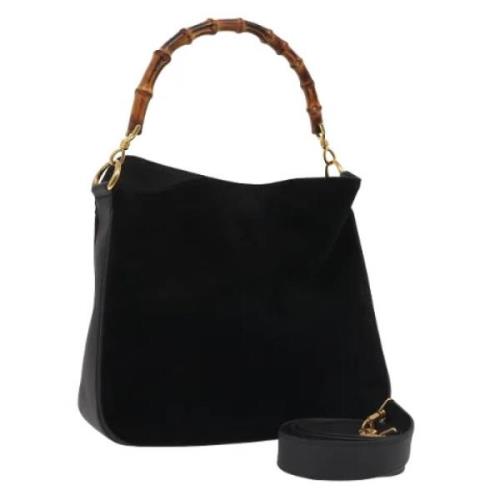 Pre-owned Suede handbags