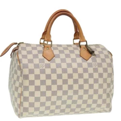 Pre-owned Canvas handbags