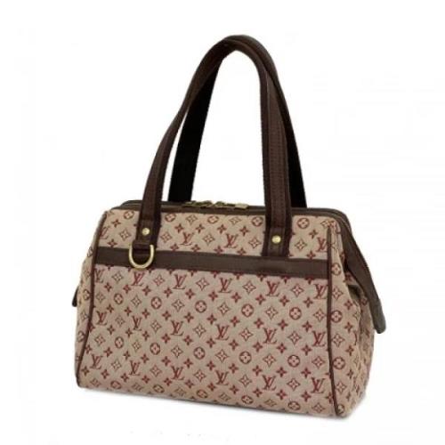 Pre-owned Fabric handbags