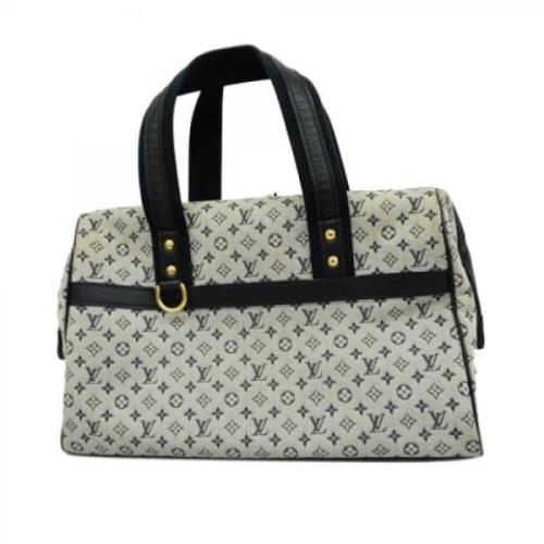 Pre-owned Fabric handbags