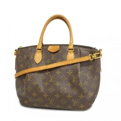 Pre-owned Fabric handbags