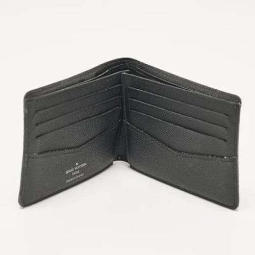 Pre-owned Coated canvas wallets