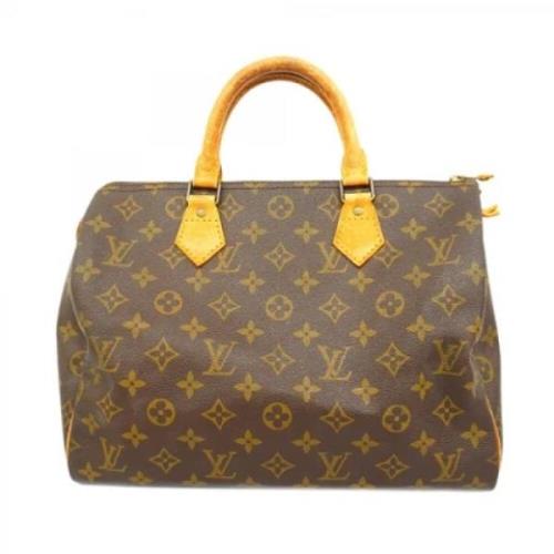 Pre-owned Fabric handbags